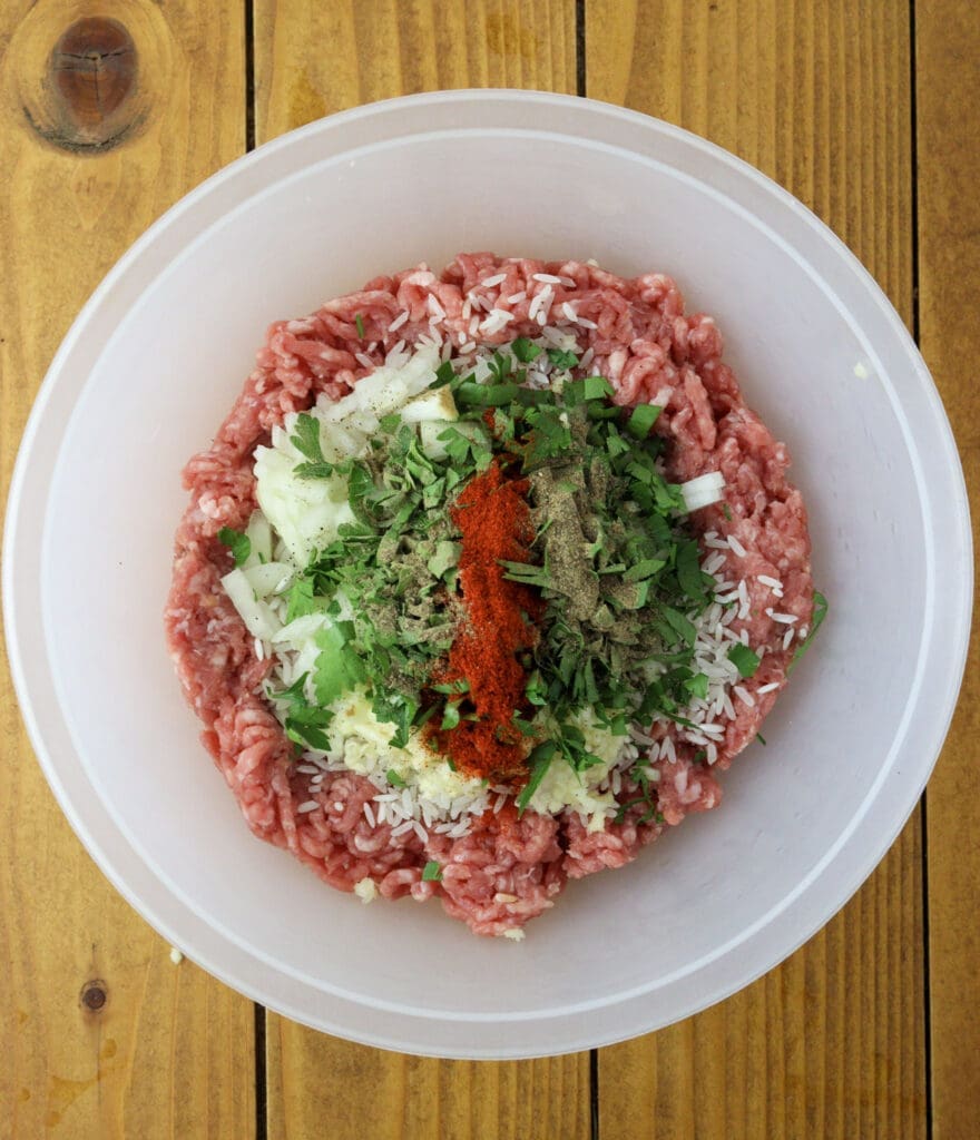 Preparing stuffing for grape vine leaves.